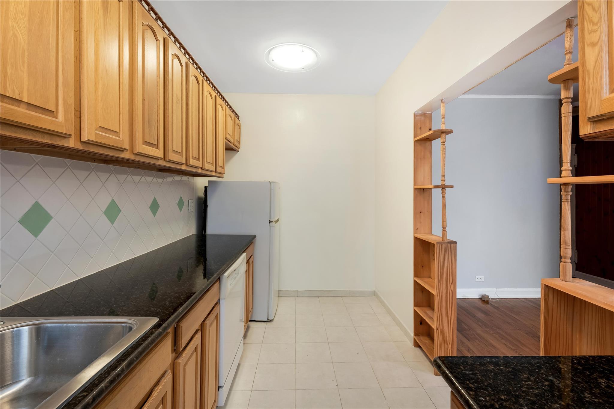 Property Photo: 84-39 153rd Avenue 1K NY 11414