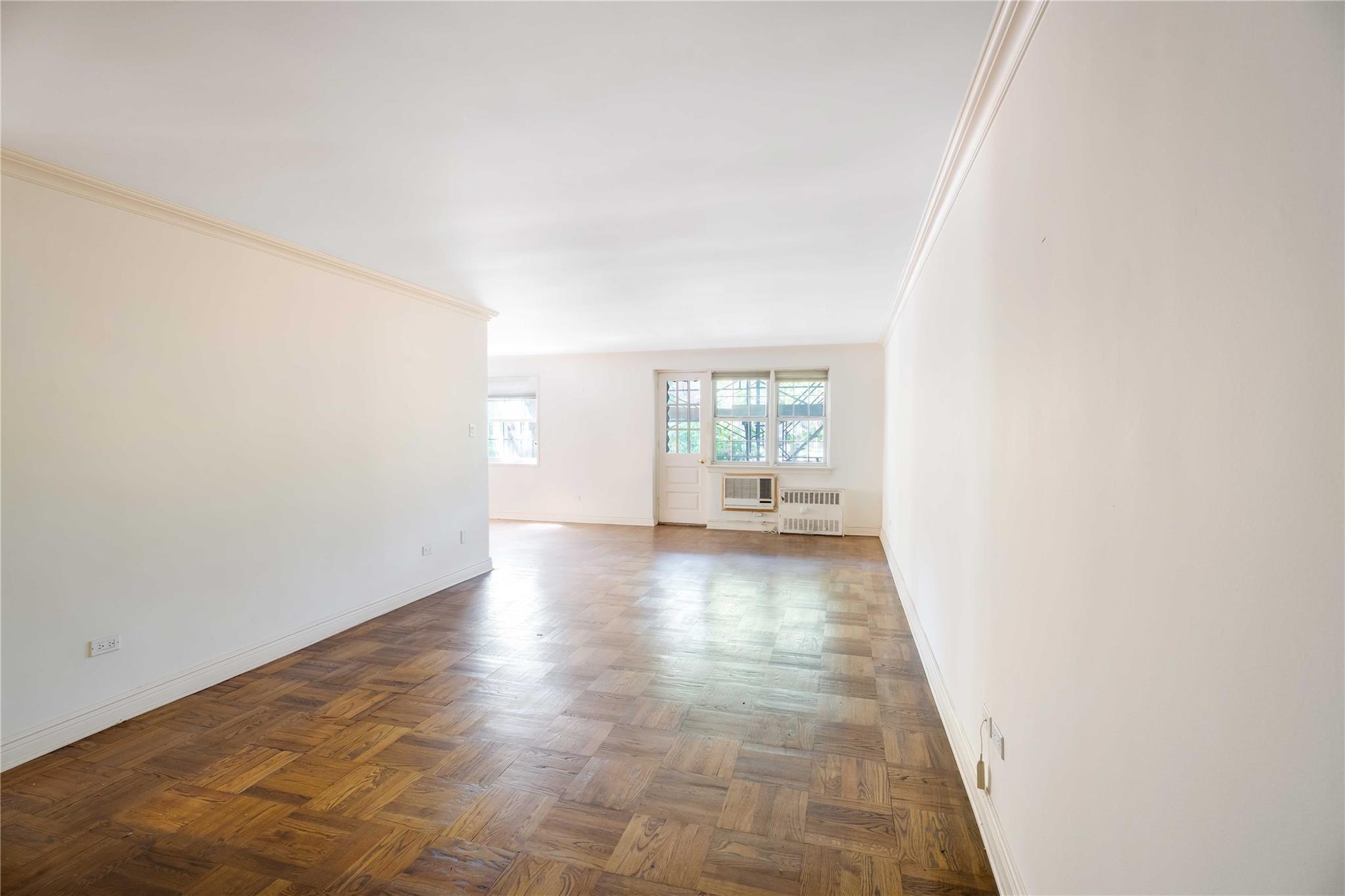 Property Photo: 84-39 153rd Avenue 1K NY 11414