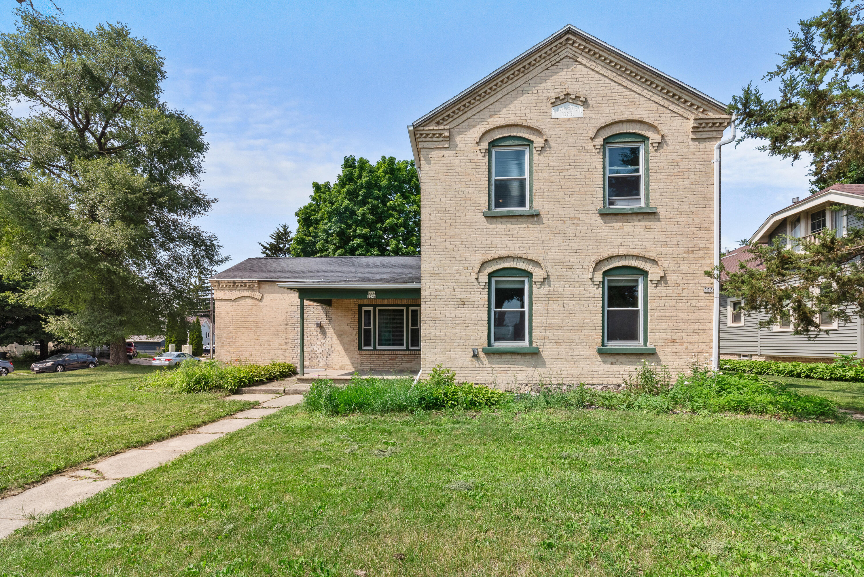 Property Photo: 224 E Washington St 228 WI 53095