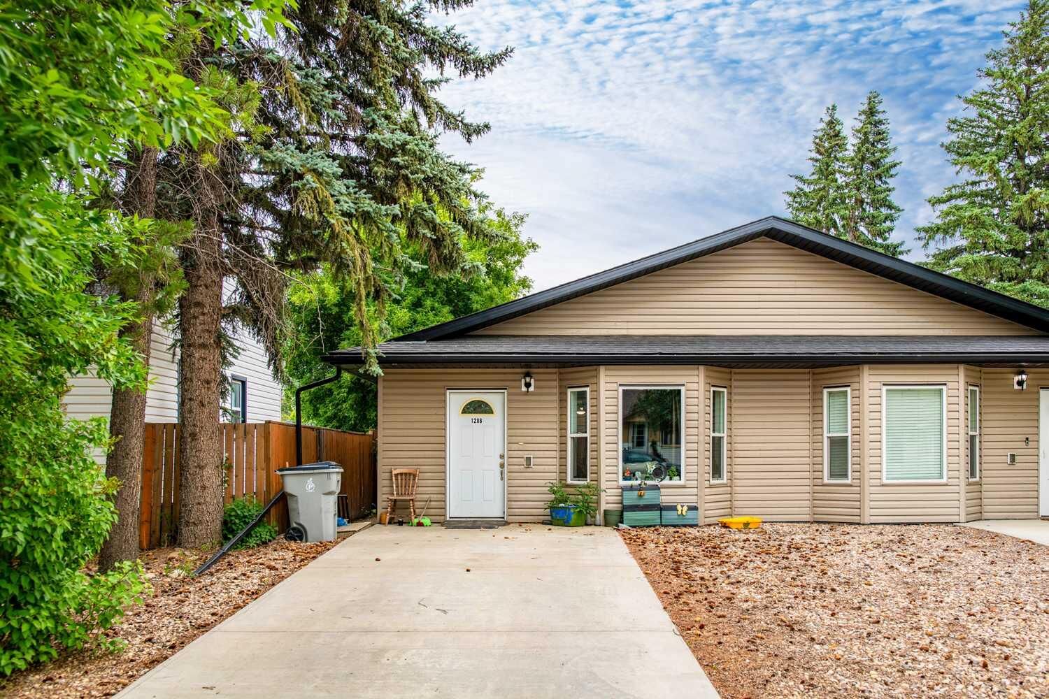 Photo de la propriété:  1206 5 Avenue  AB T9W 1L8 