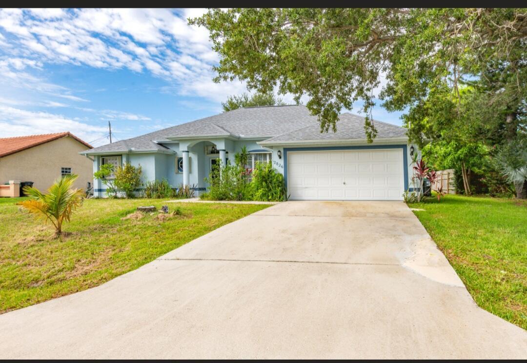 Property Photo: 2826 SW Ann Arbor Road FL 34953