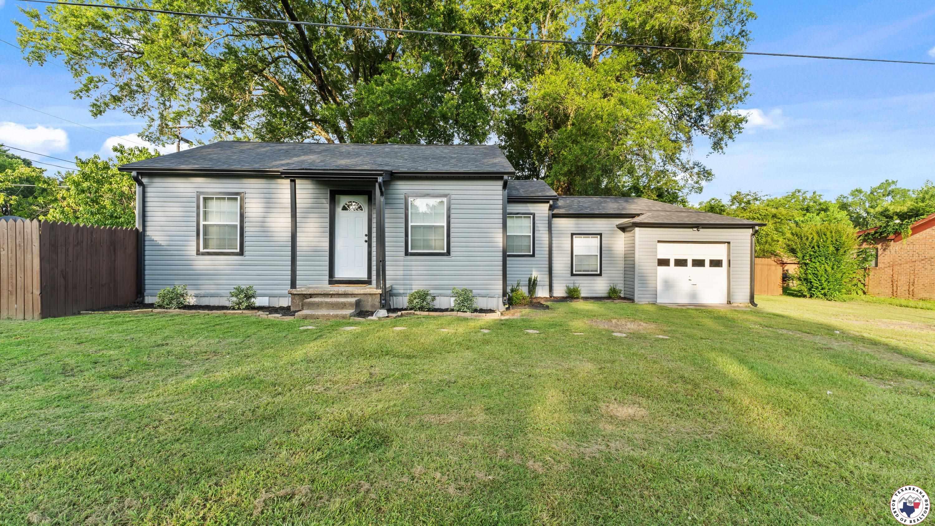 Property Photo:  405 Red River Road S  TX 75573 
