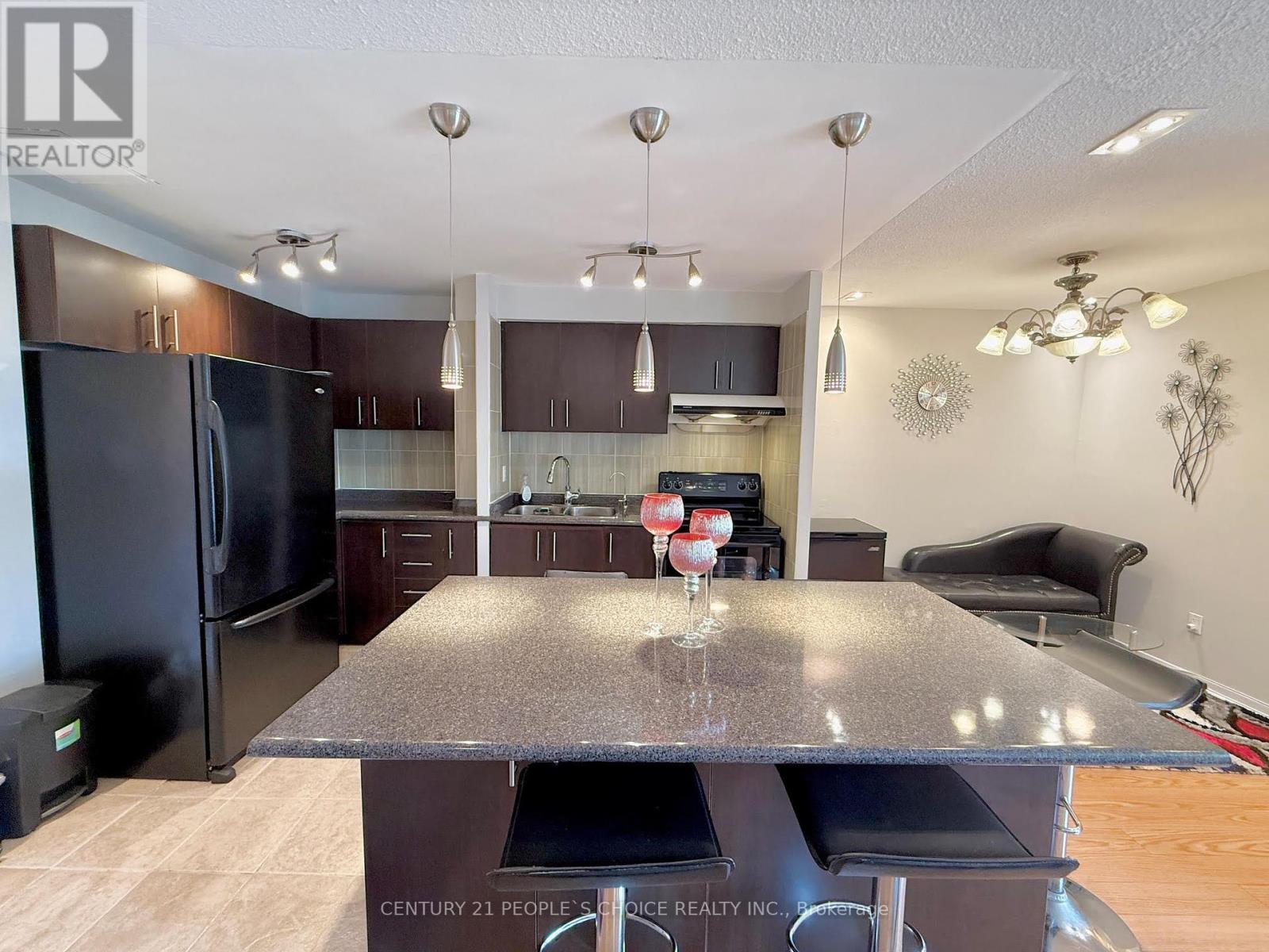 Property Photo: 2095 Roche Court 216 ON L5K 2C8
