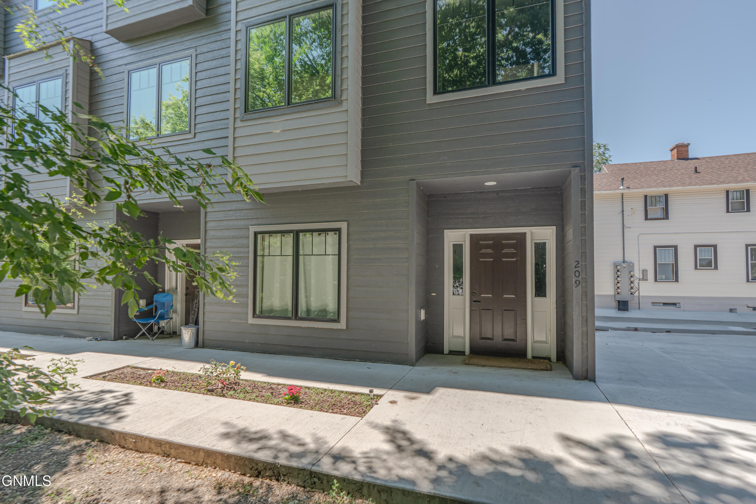 Property Photo: 209 Thayer Avenue C ND 58501
