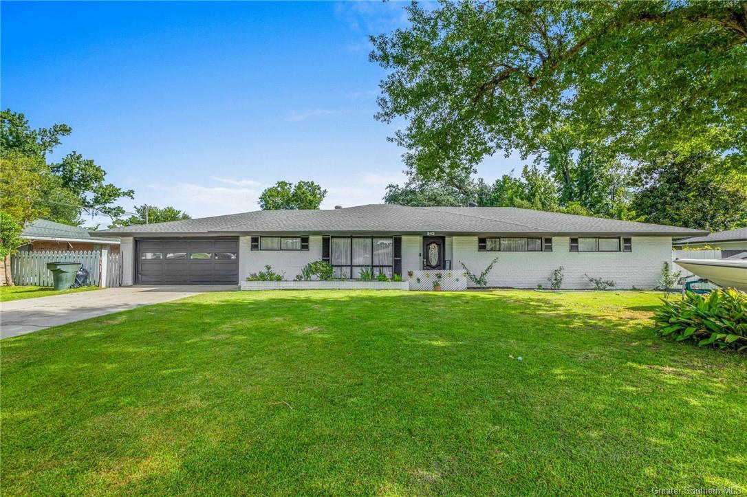 Property Photo:  242 Spring Street  LA 70605 