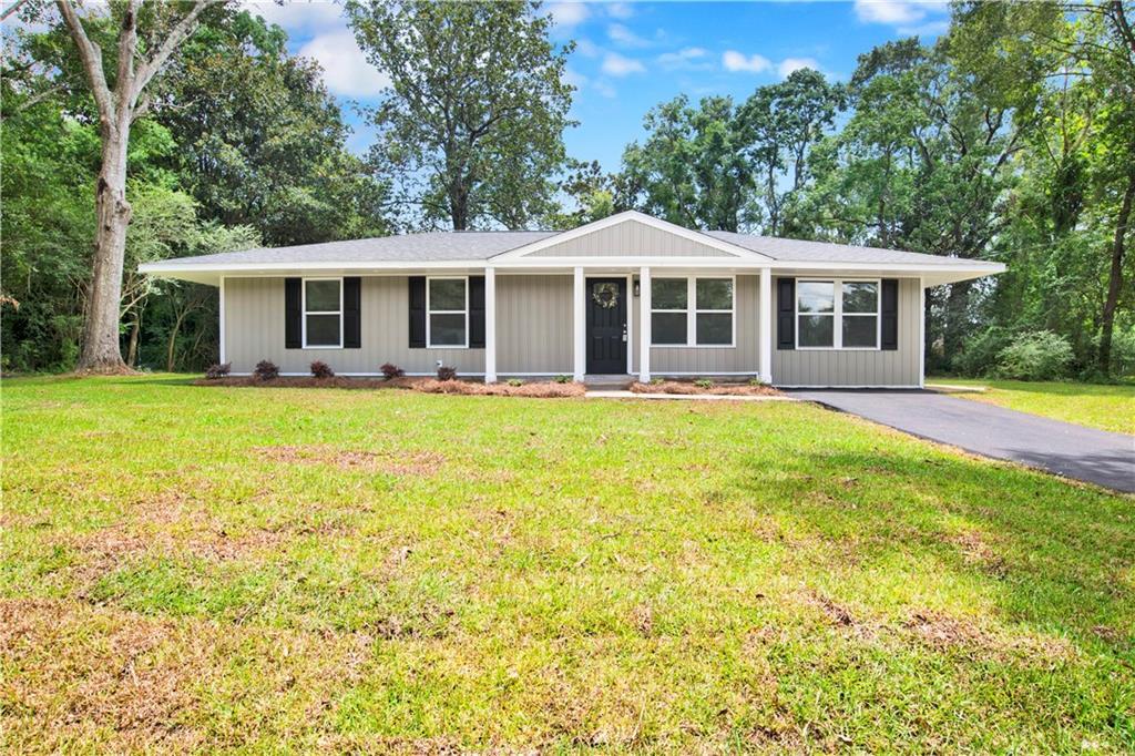 Property Photo:  8021 Docena Drive  AL 36619 