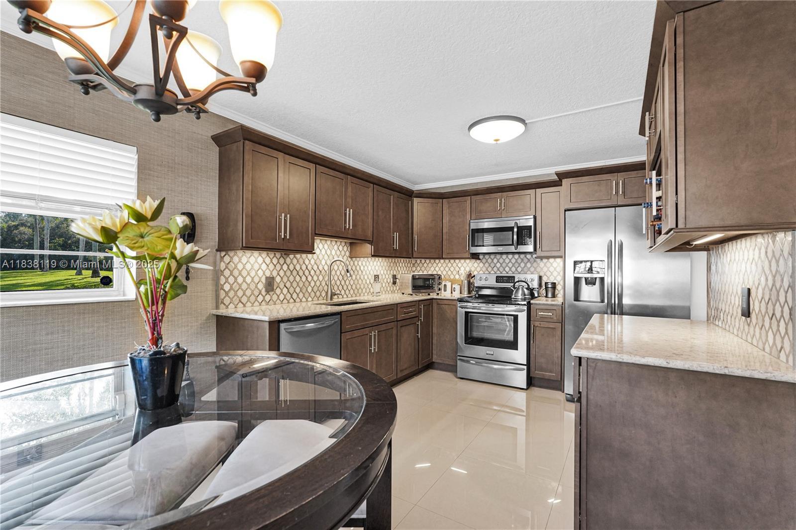 Property Photo: 12650 SW 6th St 101K FL 33027