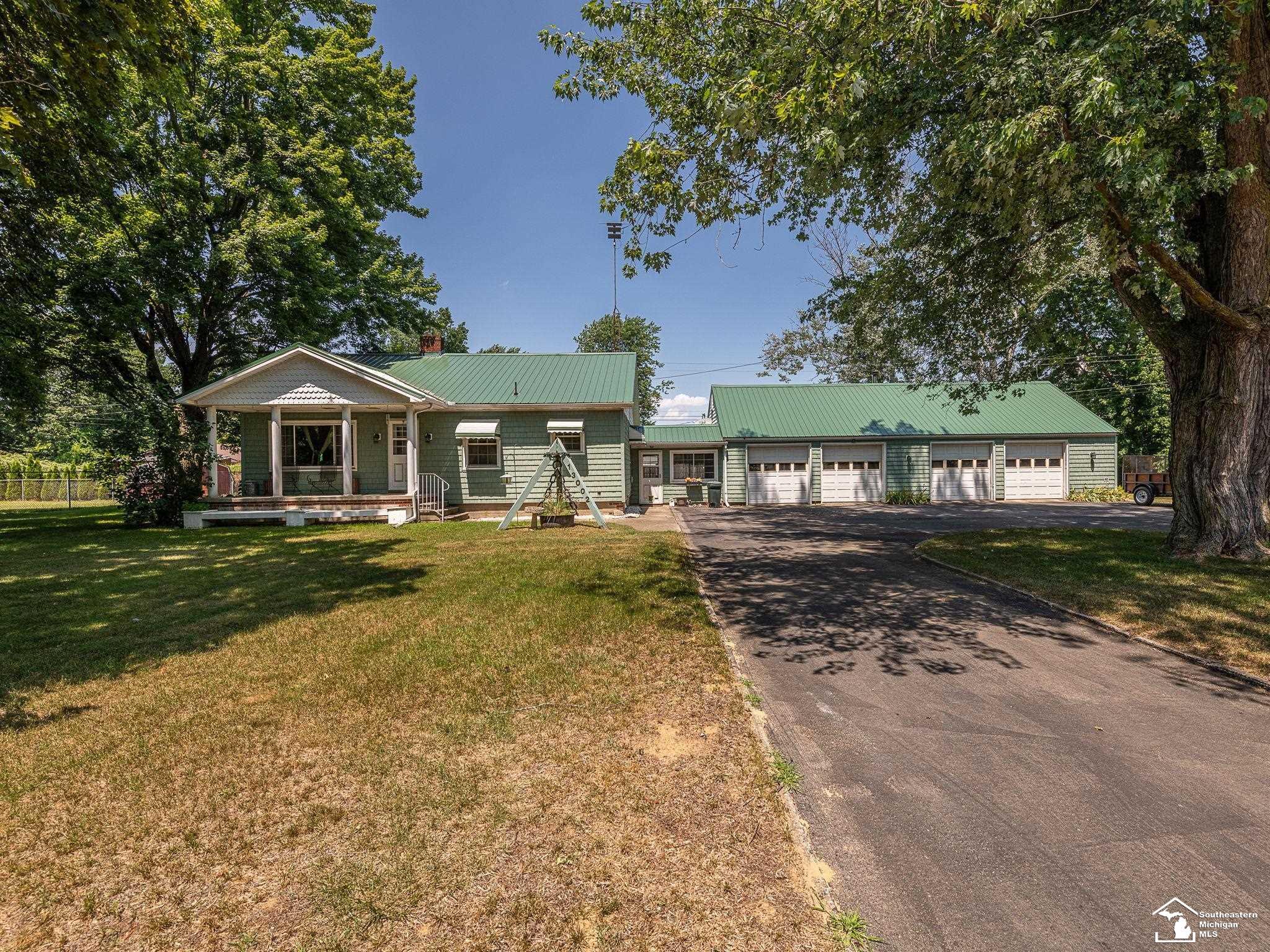 Property Photo: 13002 Ostrander Road MI 48159