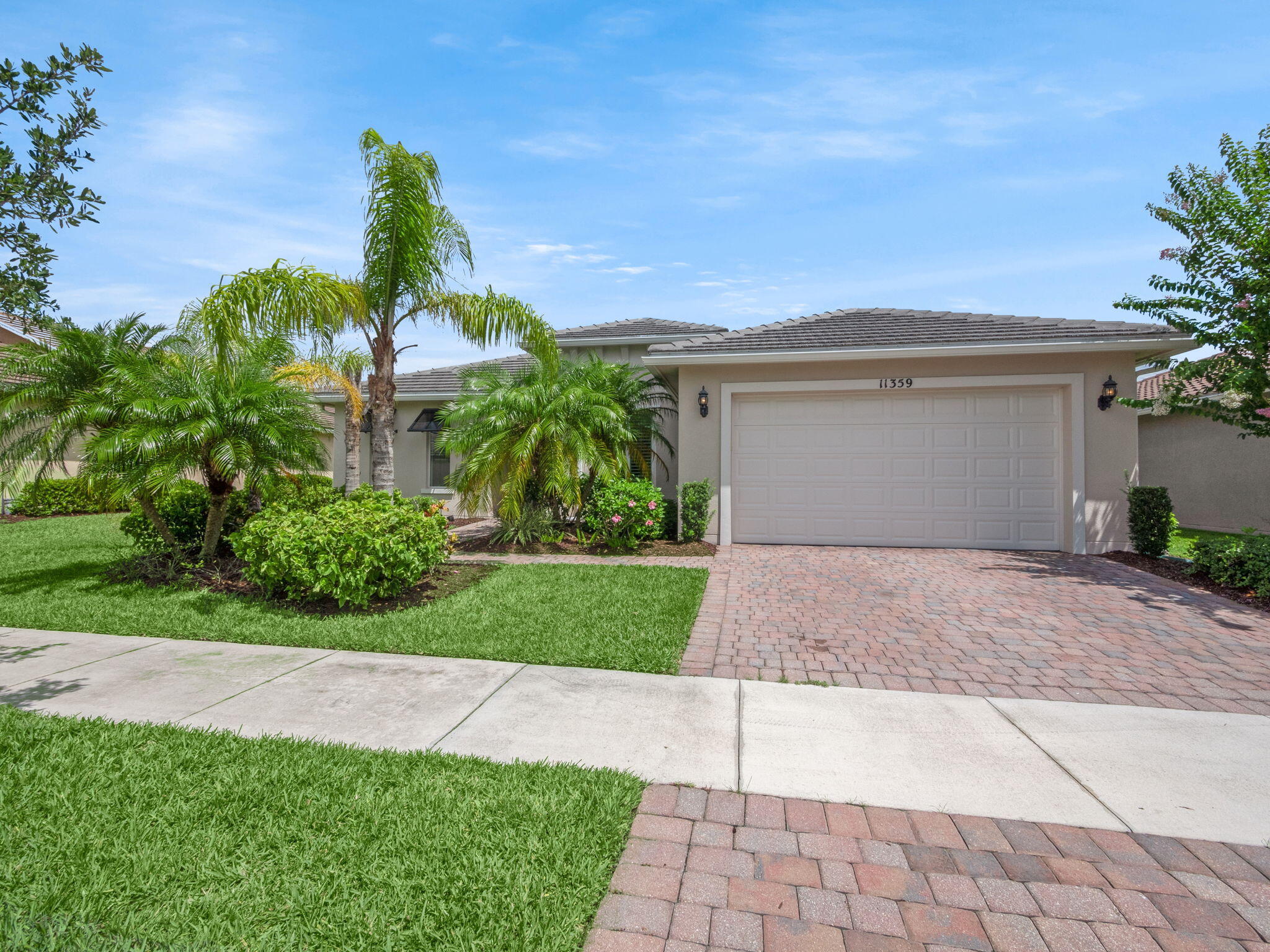 Property Photo: 11359 SW Apple Blossom Trail FL 34987