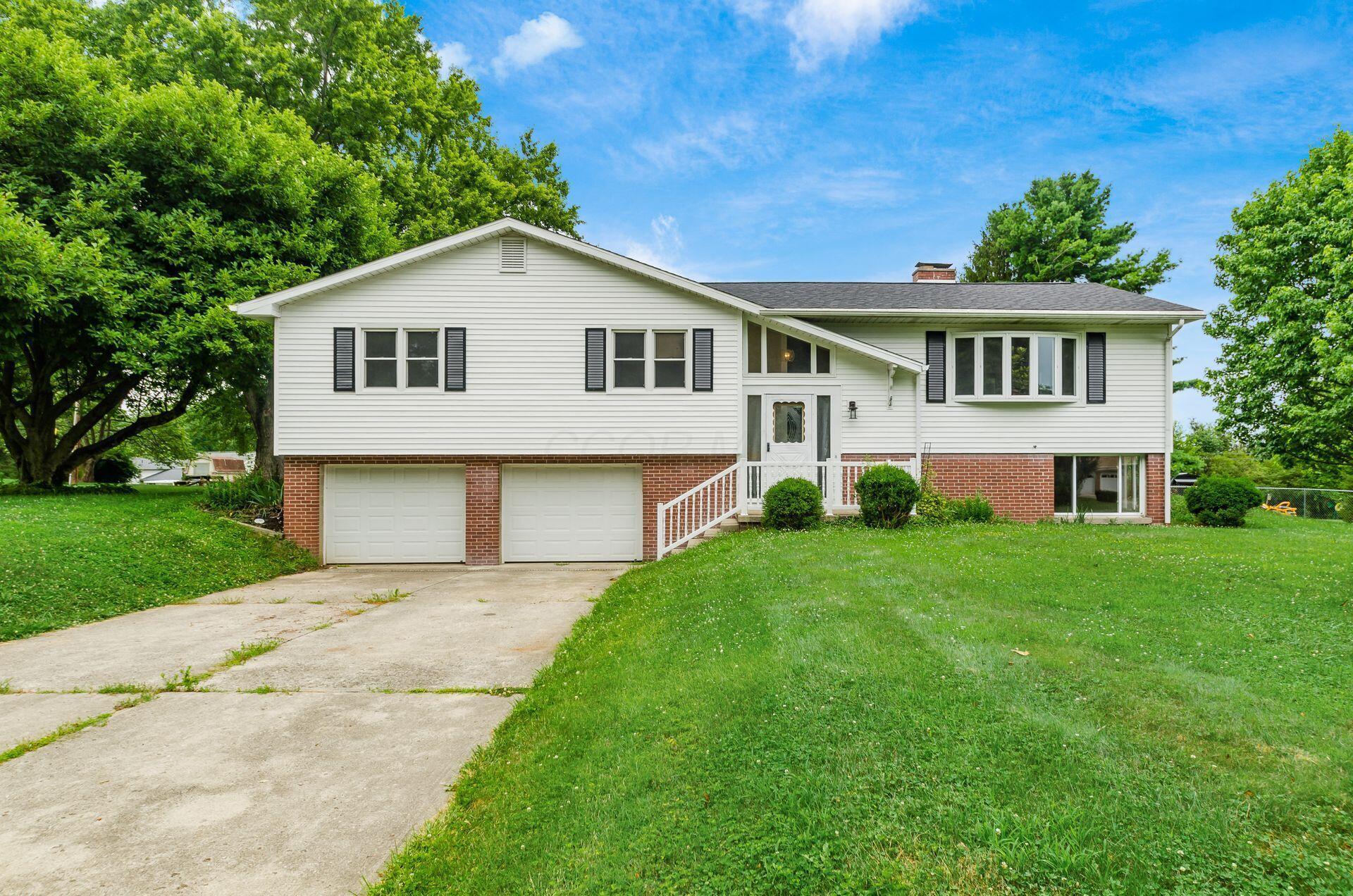 Property Photo:  5930 Coonpath NW Road  OH 43112 