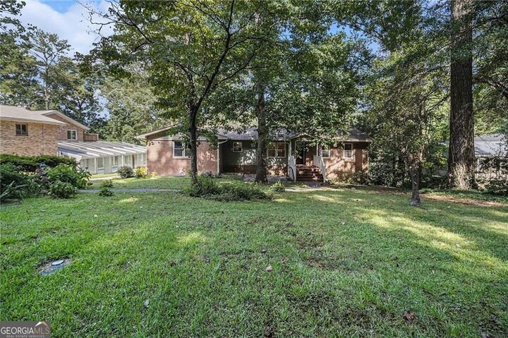 Property Photo:  2545 Rockbridge Road NW  GA 30012