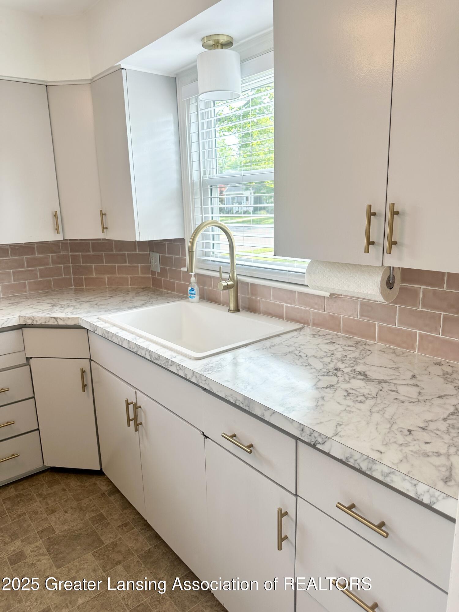 Property Photo: 1420 Cooper Avenue MI 48910
