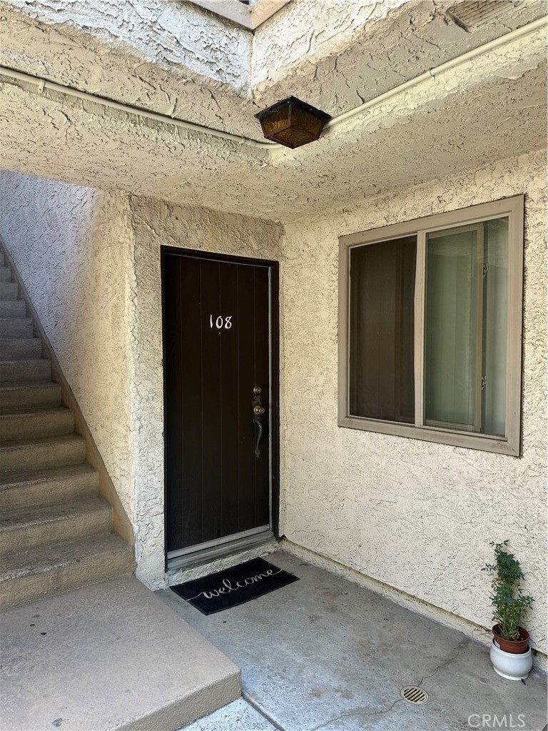 Property Photo: 7055 Etiwanda Avenue 108 CA 91335