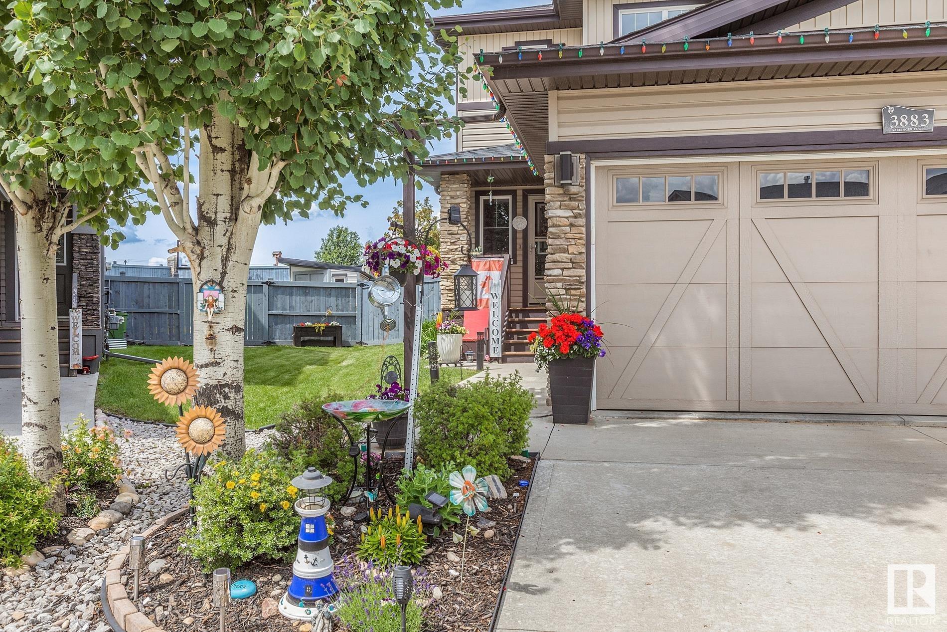 Property Photo: 3883 Gallinger Loop NW AB T5T 4G6