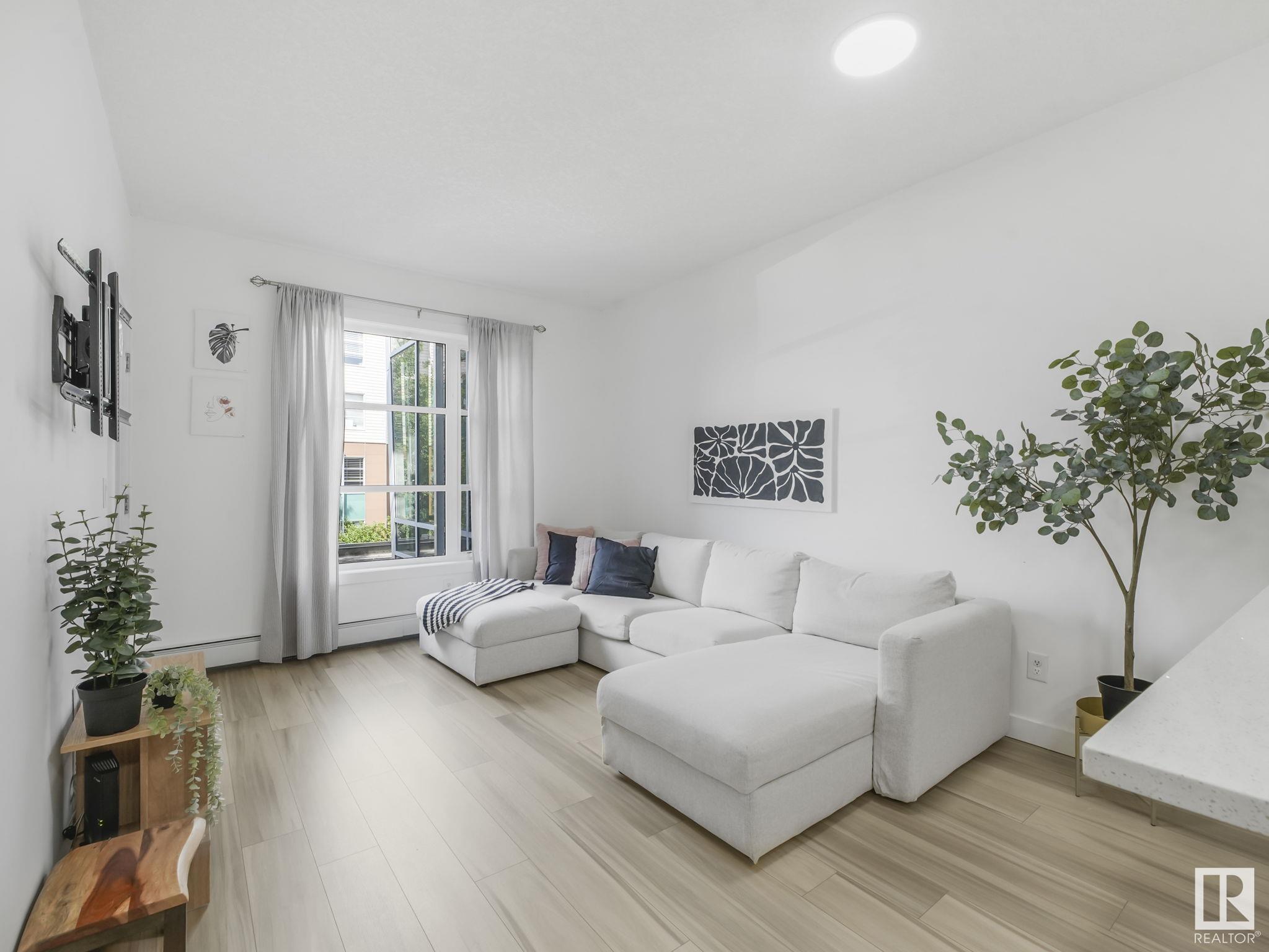 Property Photo: 2584 Anderson Way SW 201 AB T6W 0R2