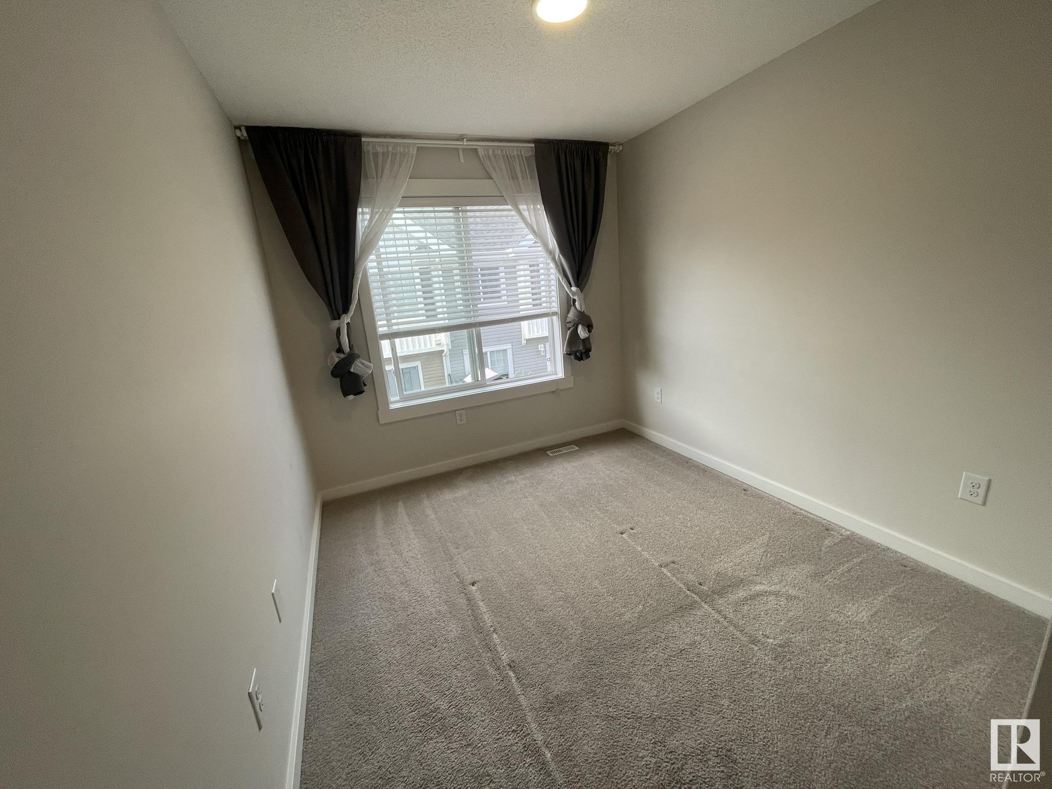 Property Photo: 903 Crystallina Nera Way NW 98 AB T5Z 0N6