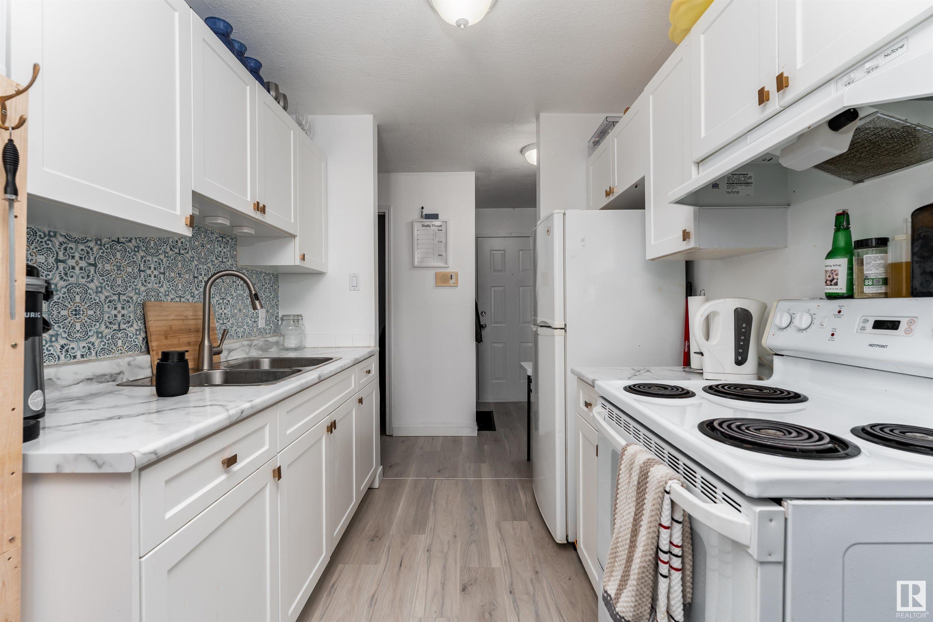 Property Photo: 8930 149 Street NW 203 AB T5R 1B8