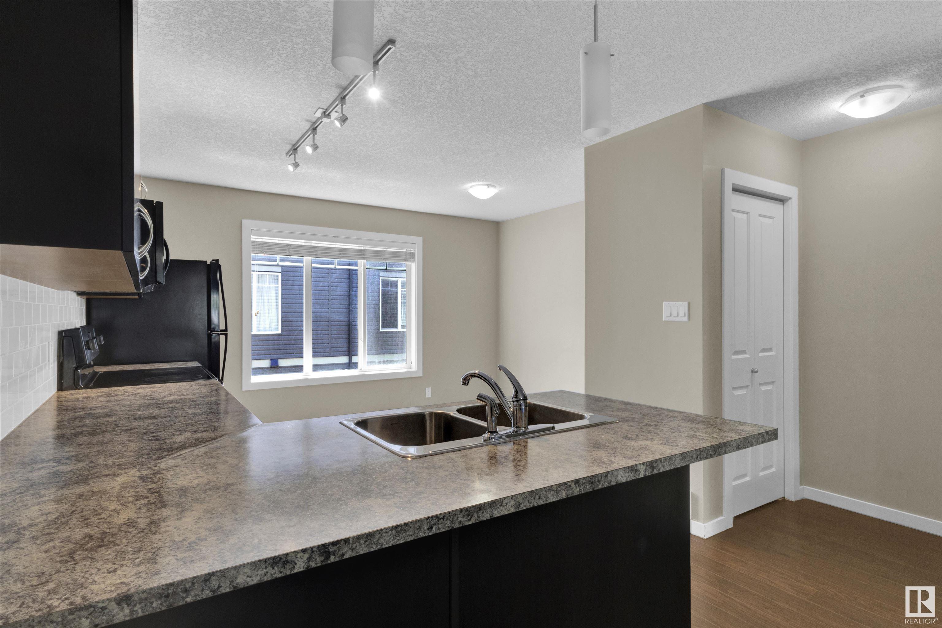 Property Photo: 9515 160 Avenue NW 50 AB T5Z 0M4