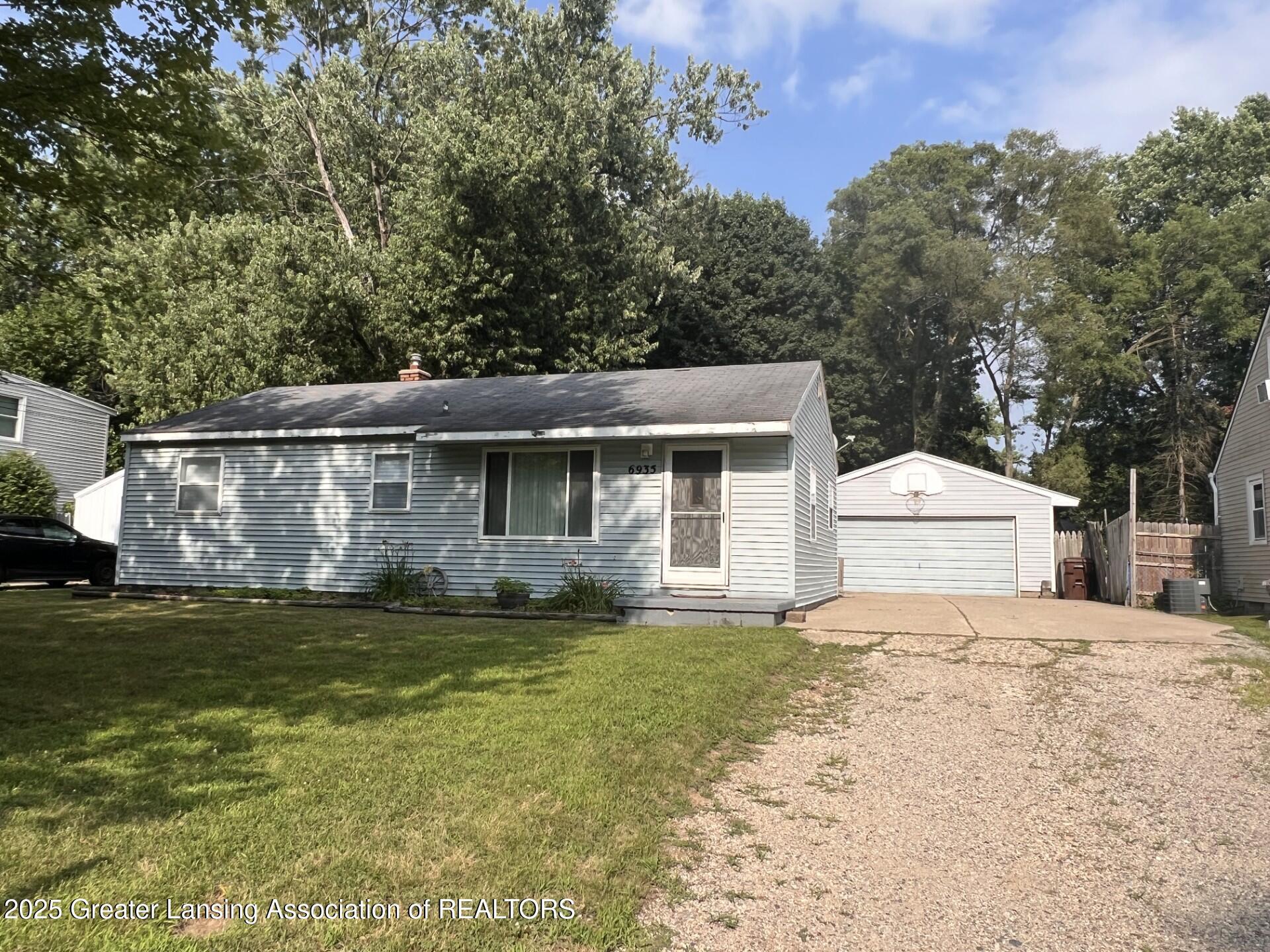 Property Photo:  6935 Cooper Road  MI 48911 