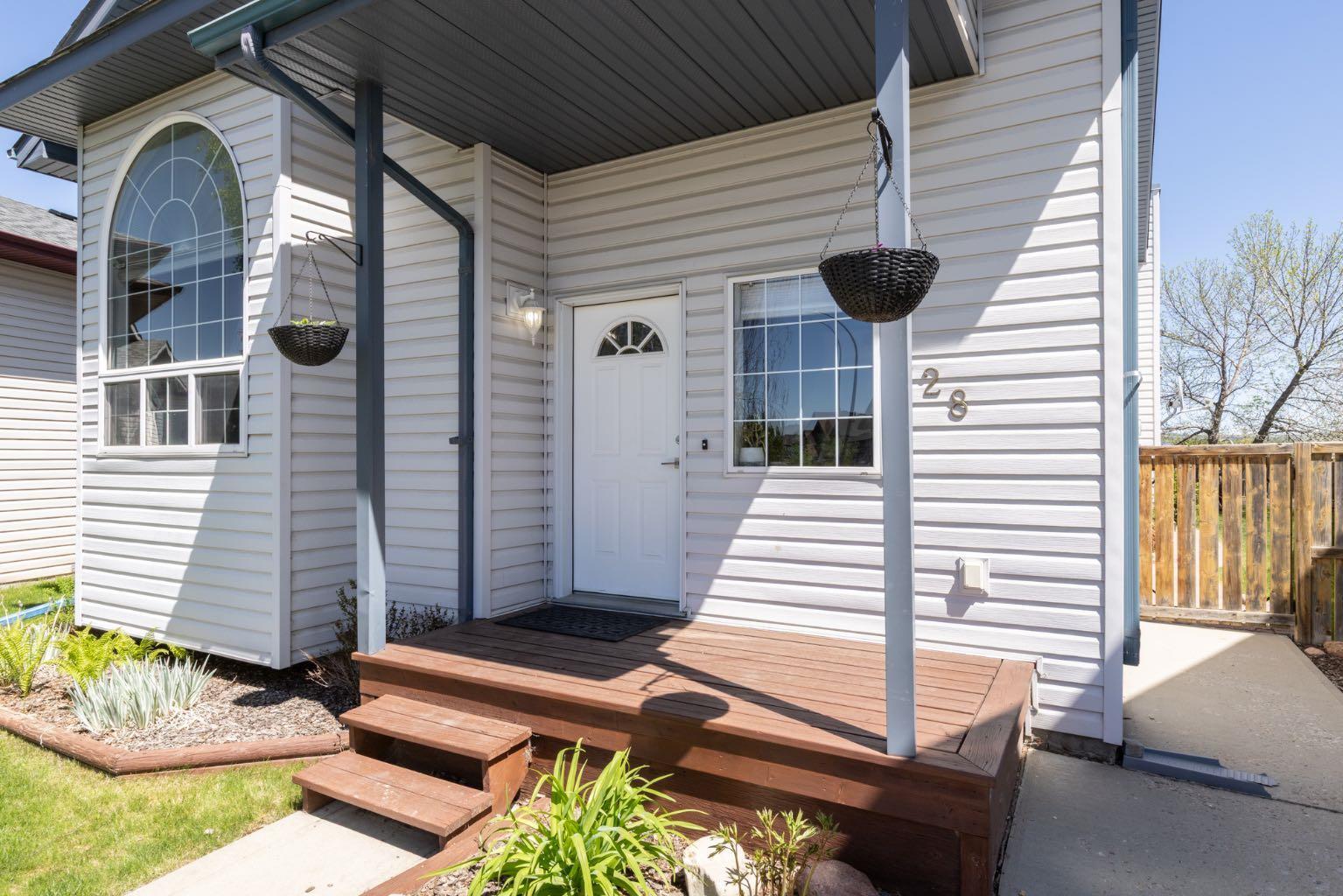 Property Photo: 228 Deschner Close AB T4R 3C2