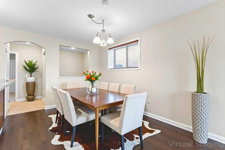 Property Photo:  50 Mike Ralph Way SW  AB T3E 0H8 