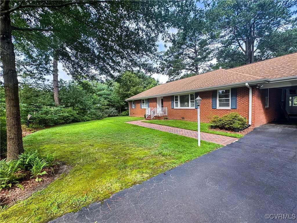Property Photo:  9072 Craney Island Road  VA 23116 