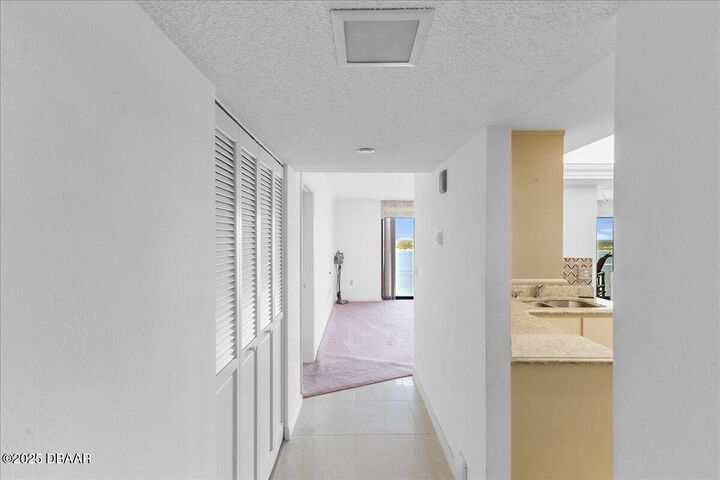 Property Photo: 1 Oceans West Boulevard 21A1 FL 32118