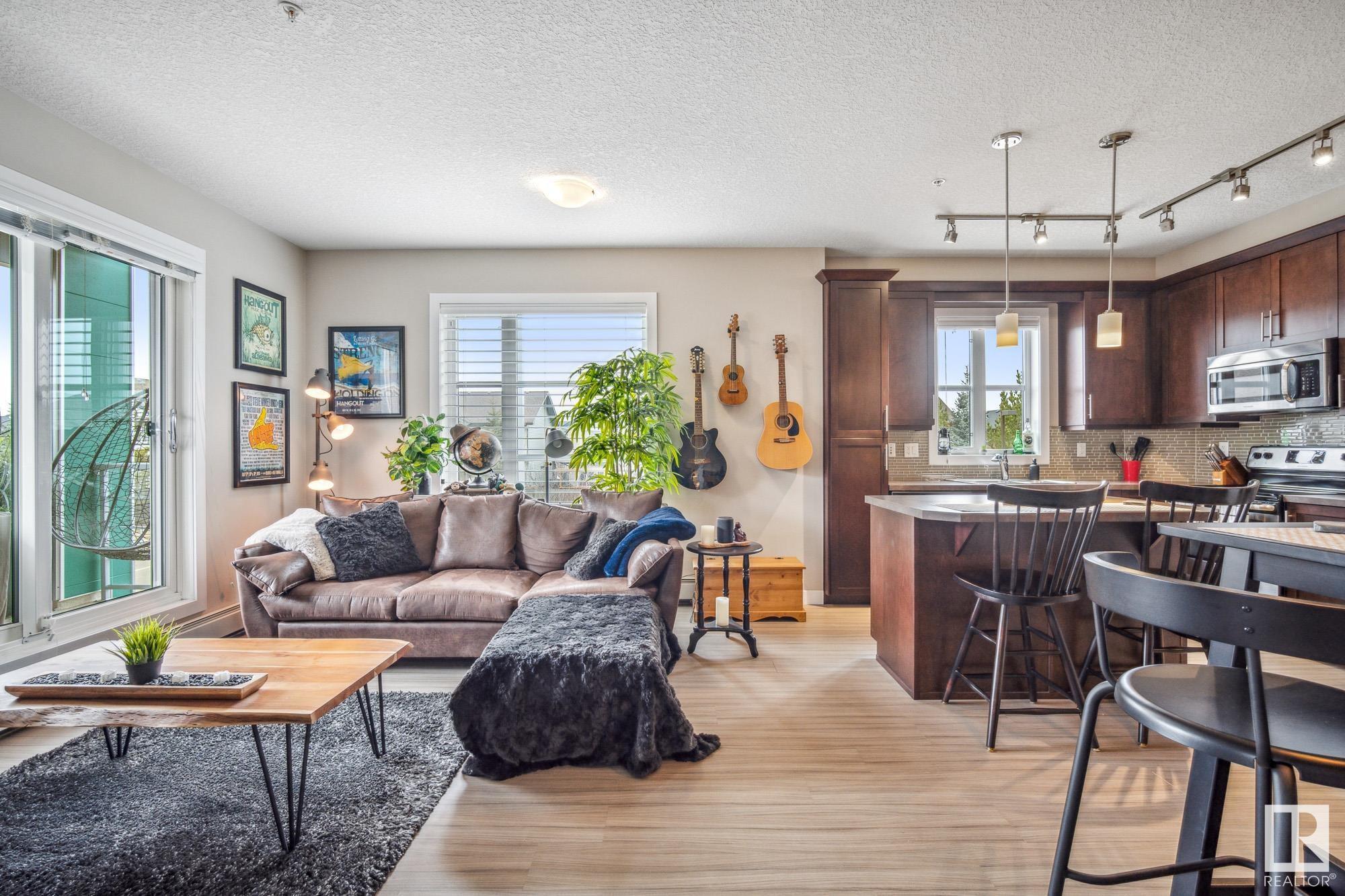 Property Photo: 2588 Anderson Way SW 204 AB T6W 0R2
