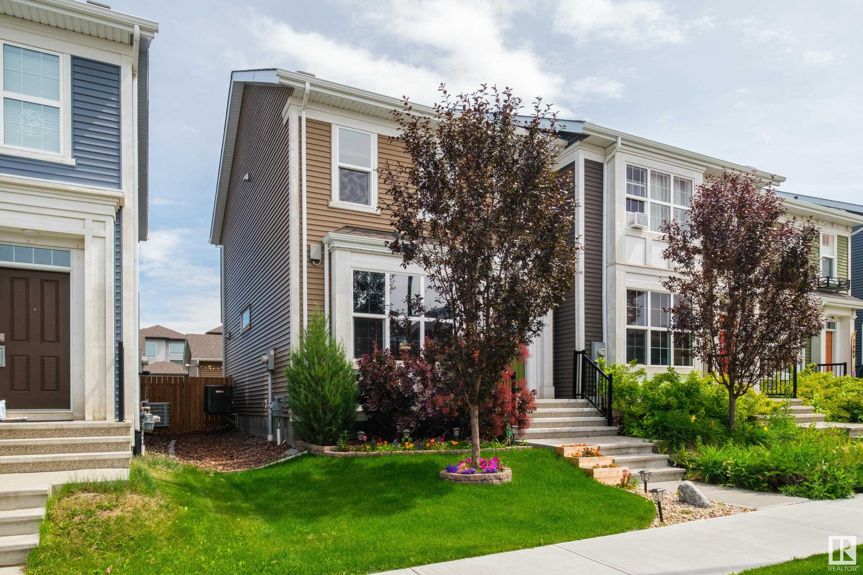 Property Photo: 2663 Maple Way NW AB T6T 2E9