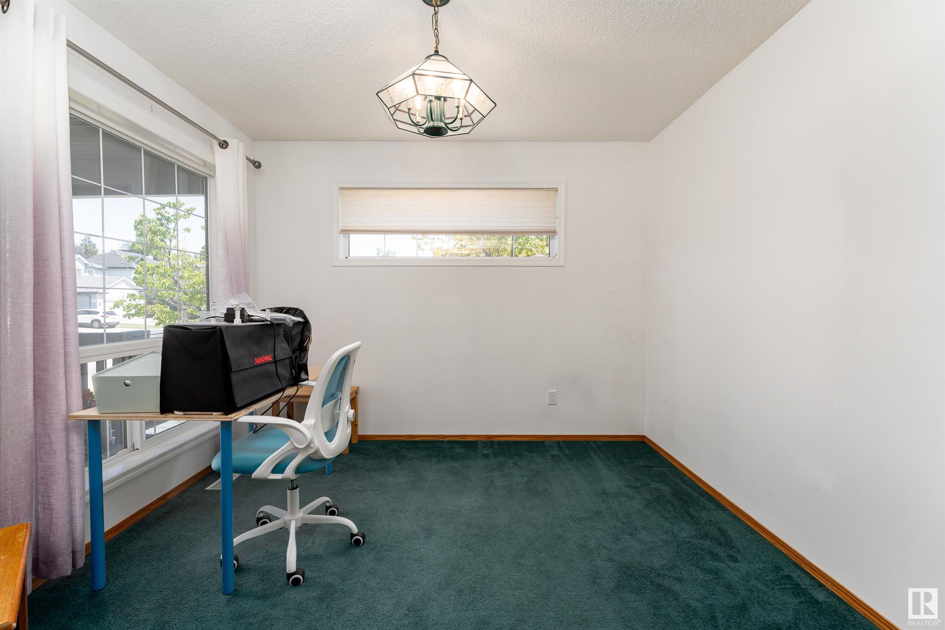 Property Photo: 11805 10A Avenue NW AB T6J 7A7