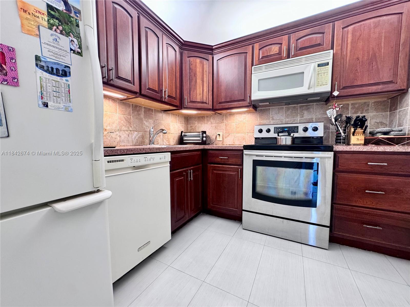 Property Photo: 20500 W Country Club Dr 210 FL 33180
