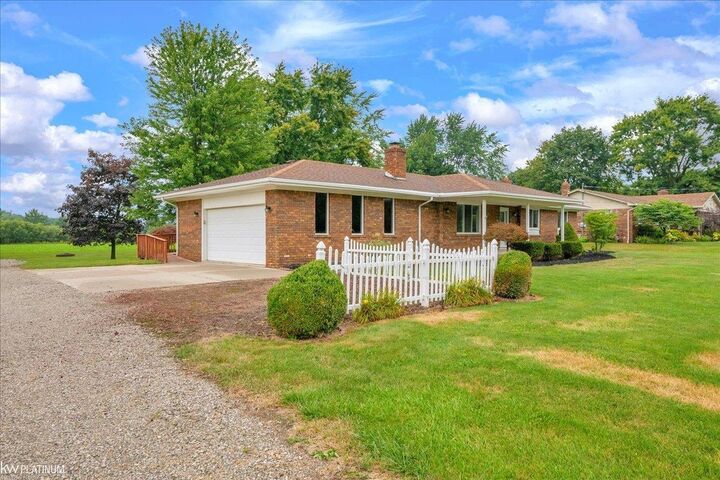 Property Photo:  67575 Lowe Plank Road  MI 48002 
