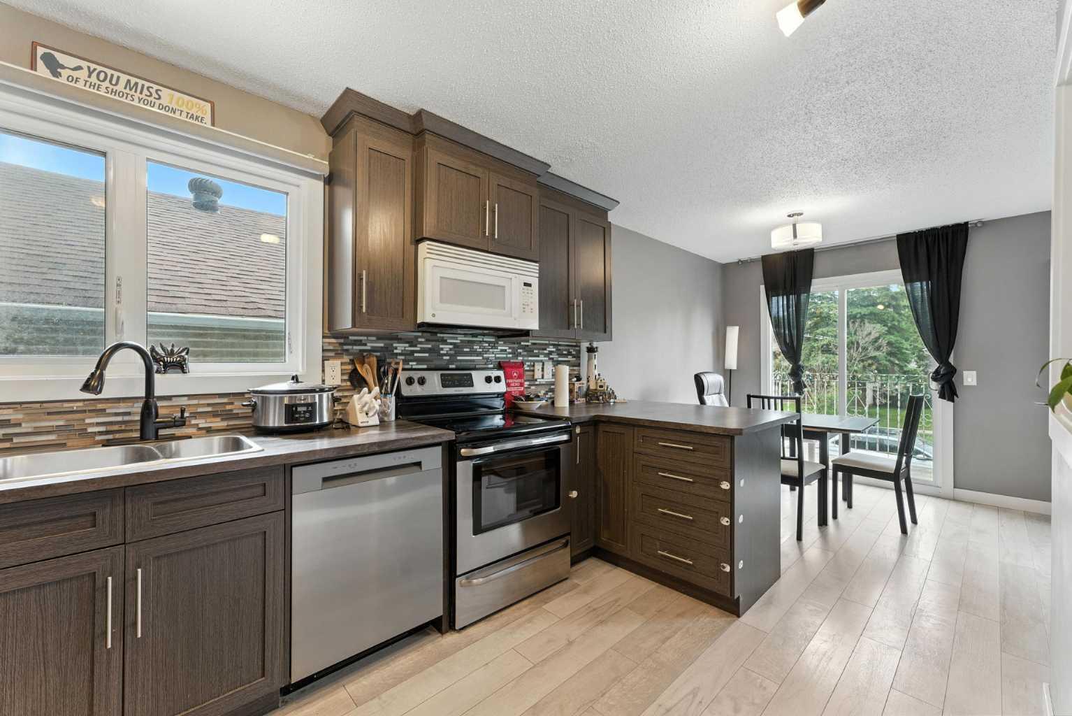 Property Photo: 125 10 Avenue NE 1 AB T2E 0W8
