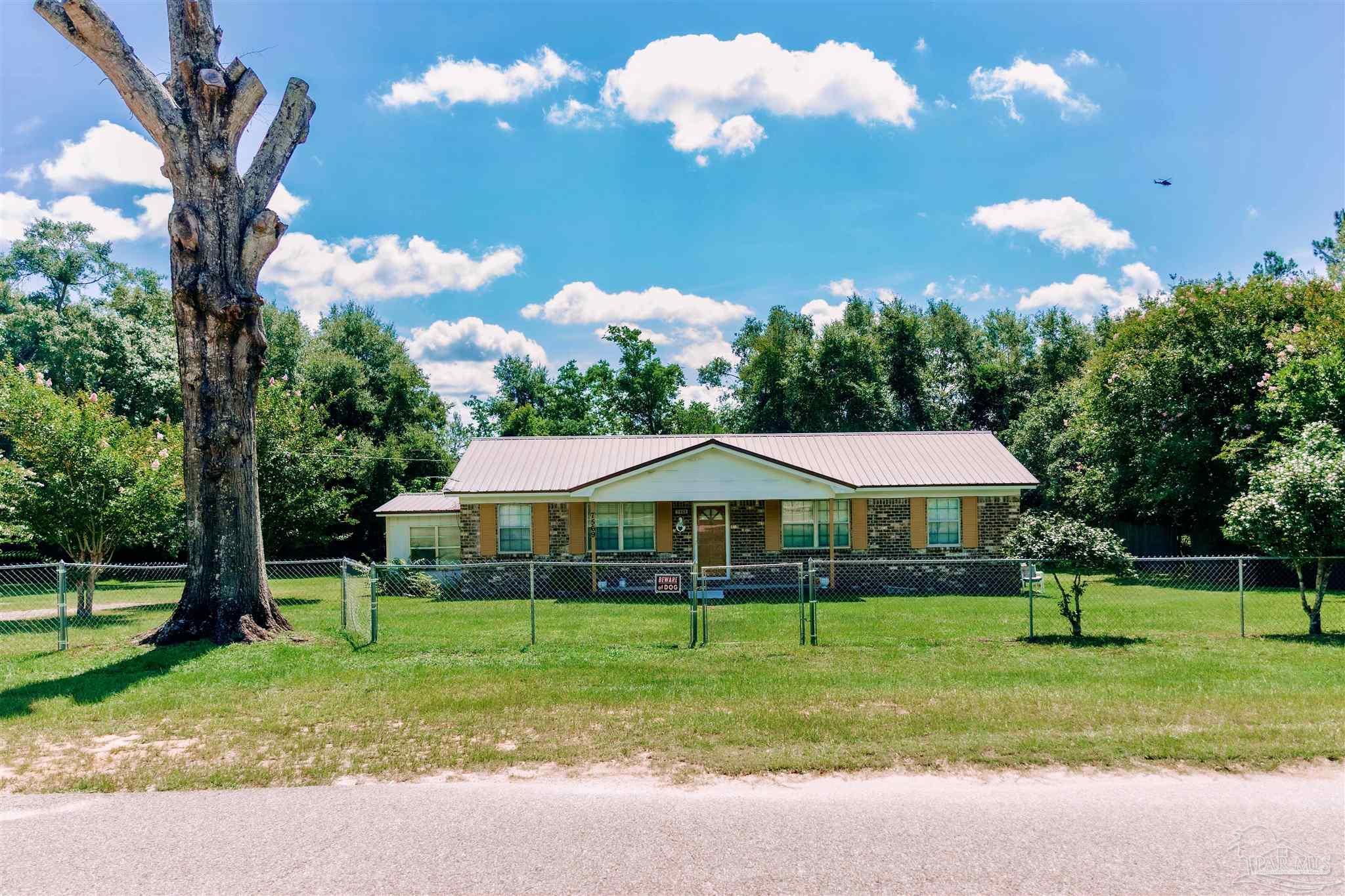 Property Photo: 7569 Pine Meadows Loop FL 32571