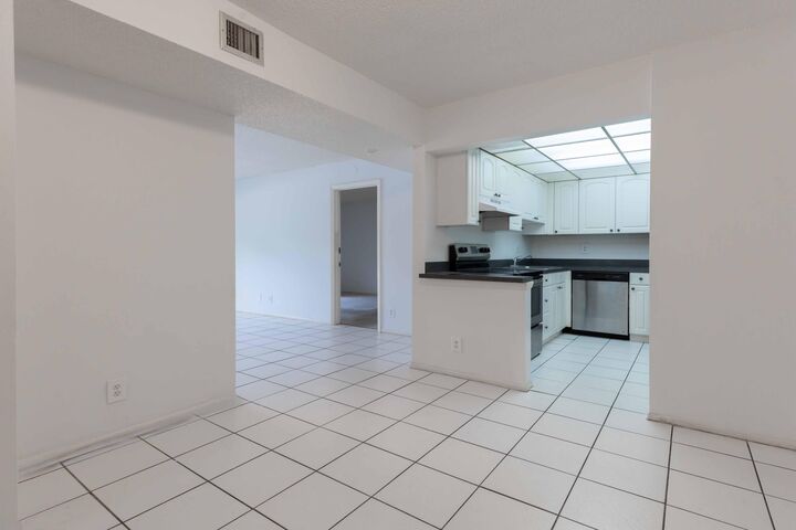Property Photo: 490 NW 20th Street 1050 FL 33431