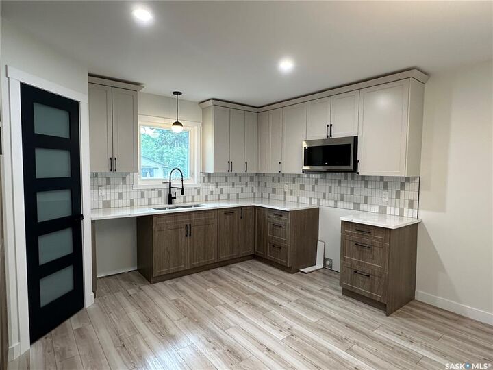 Property Photo:  230 8th Street  SK S4H 1E2 