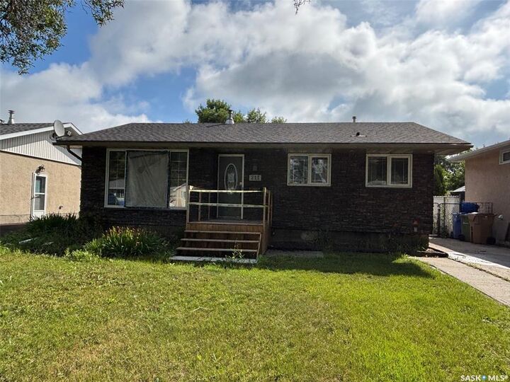 Property Photo: 211 Upland Drive SK S4R 6C6