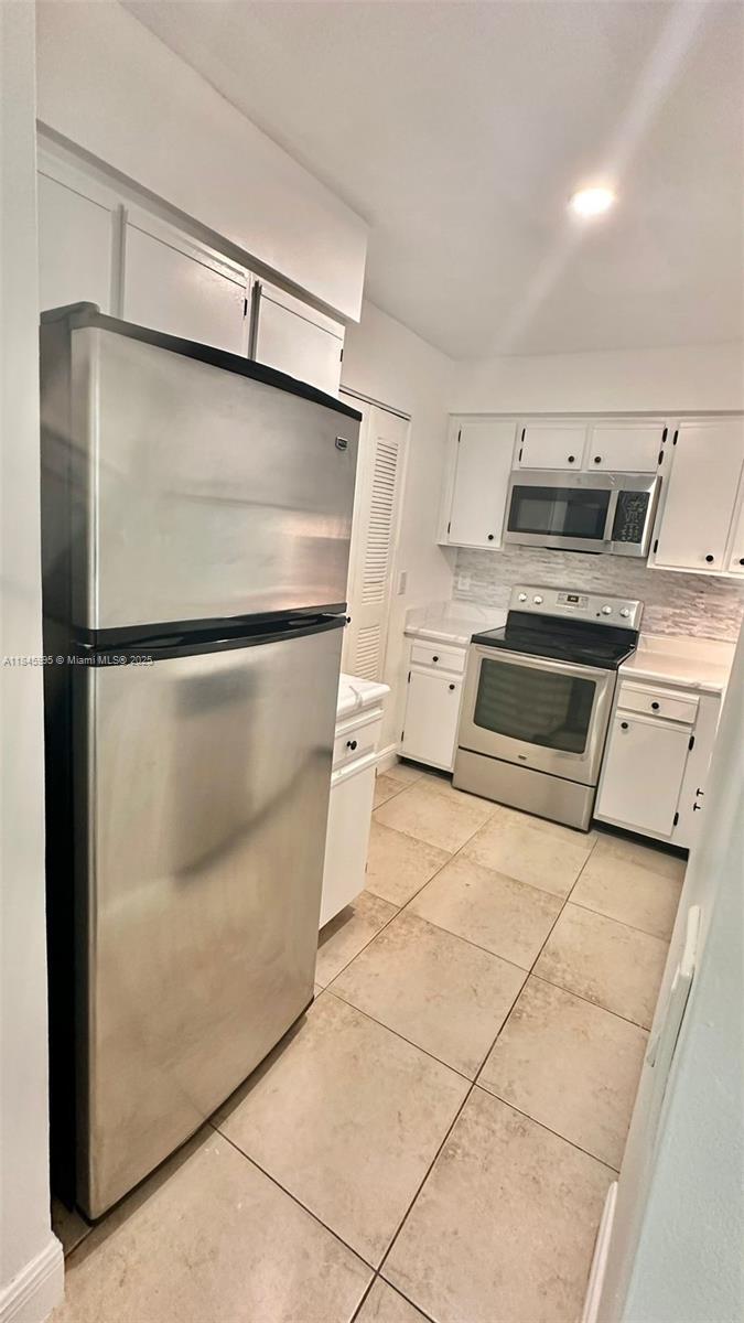 Property Photo:  1245 SW 46th Ave 1209  FL 33069 