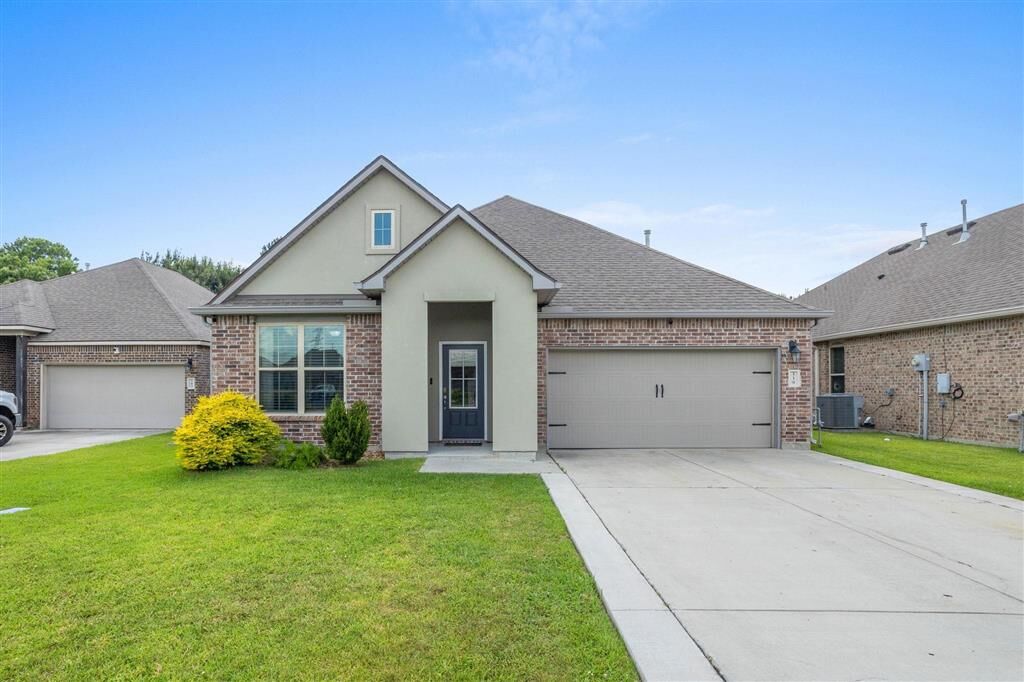 Property Photo:  339 Windsor Woods  LA 70665 