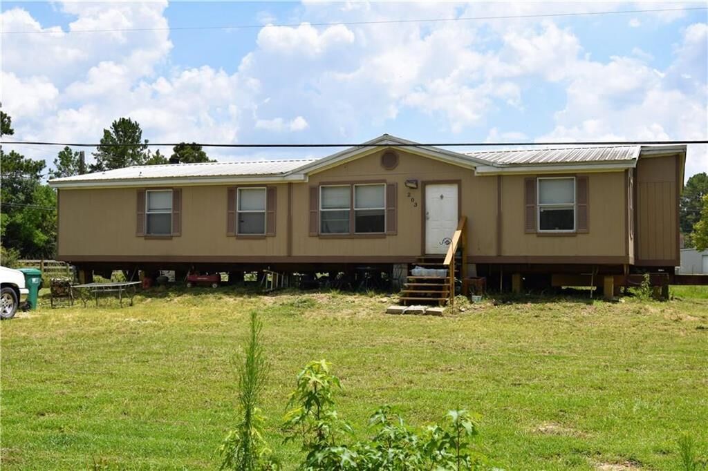 Property Photo: 203 Tillie Ledoux Road LA 70663