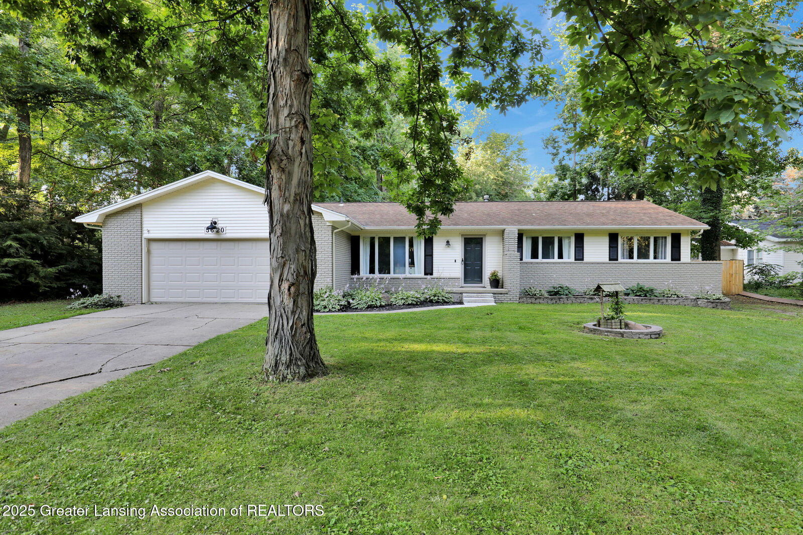 Property Photo:  5620 Grand River Drive  MI 48837 