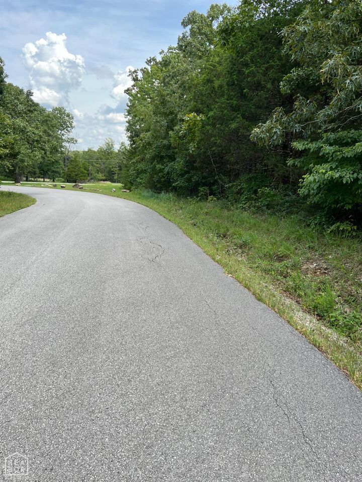 Property Photo: 807 W W. Tri Lakes AR 72512