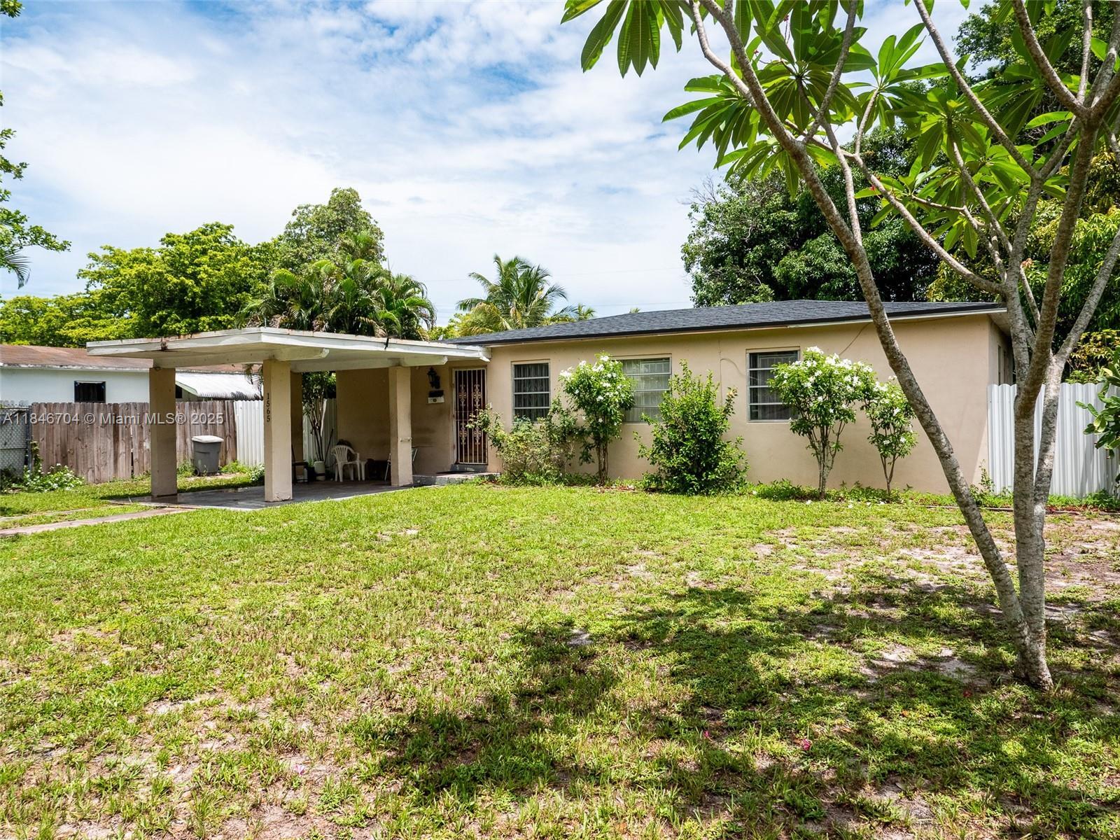 Property Photo:  1565 NW 127th St  FL 33167 