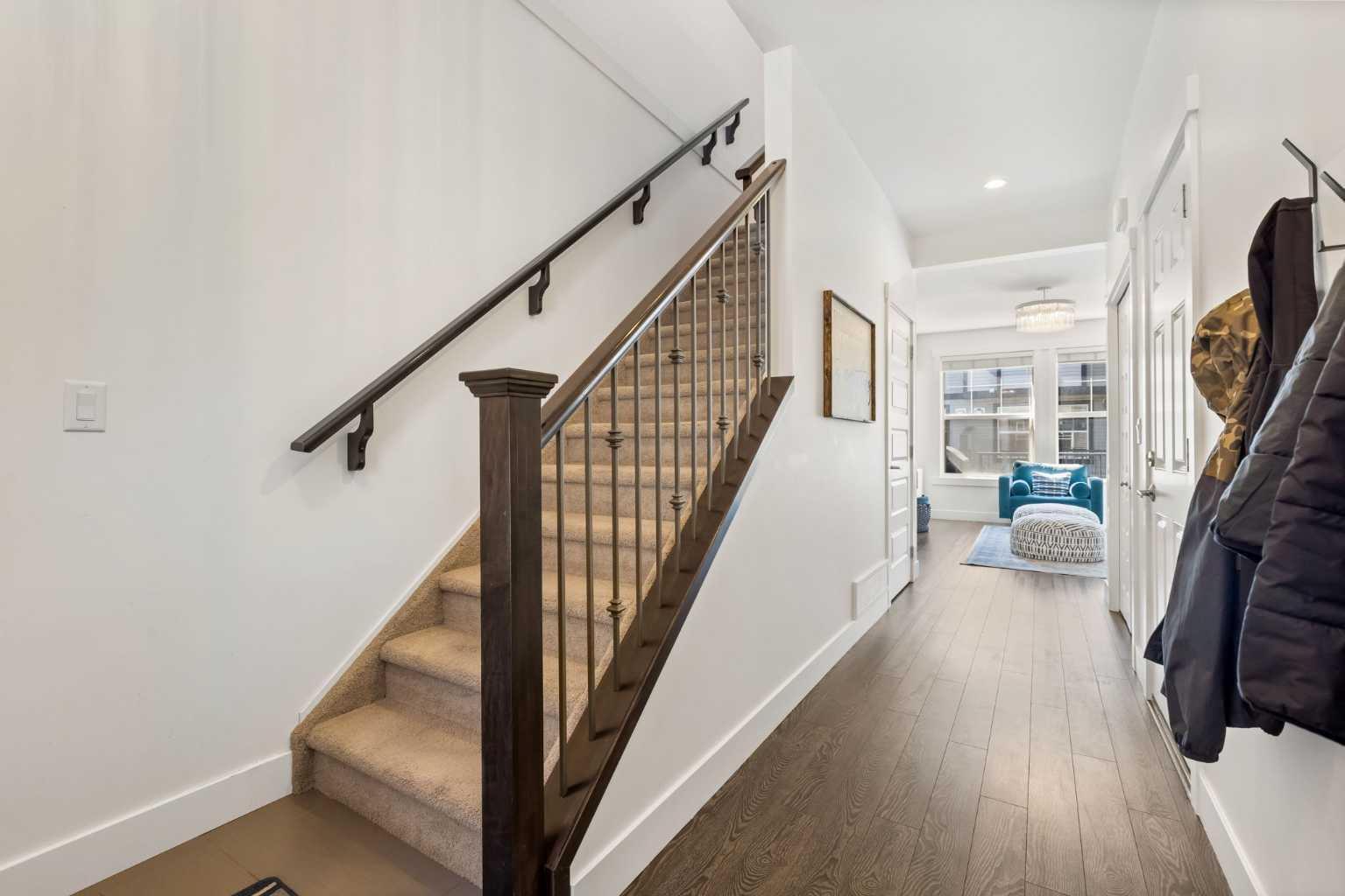 Property Photo: 110 Coopers Common SW 702 AB T4B 3Y3