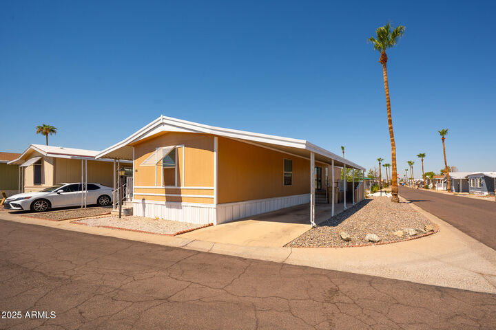 Property Photo: 10955 N 79th Avenue 60 AZ 85345