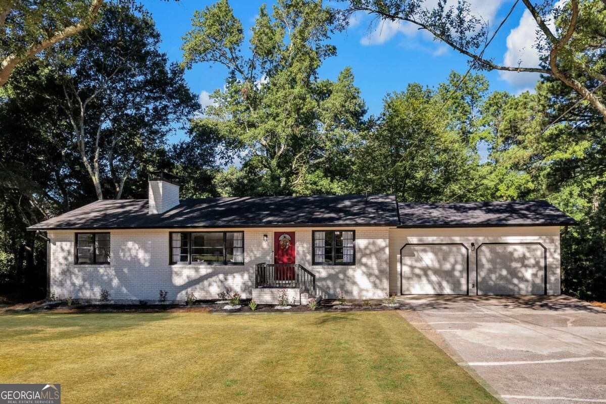 Property Photo:  3595 Trickum Road NE  GA 30066 