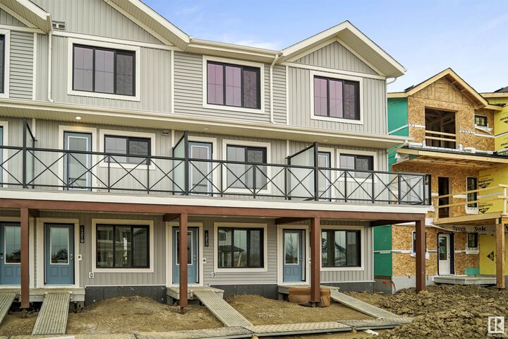 Property Photo: 112 Ficus Way AB T8L 0Z6