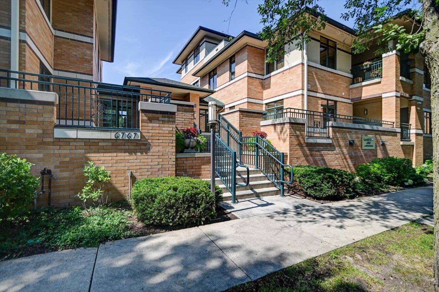 Property Photo: 6767 Frank Lloyd Wright Avenue 103 WI 53562