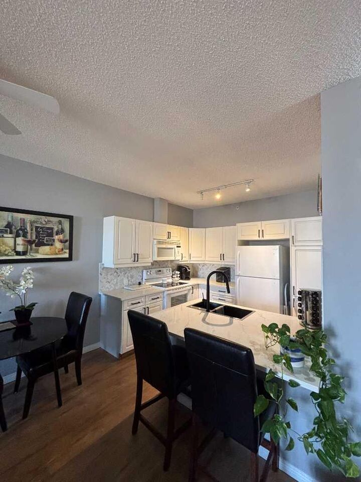 Property Photo: 14645 6 Street SW 4413 AB T2Y 3Y1