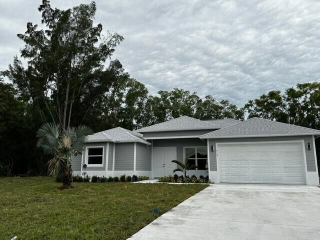 Property Photo: 419 SW Namoit Place FL 34953